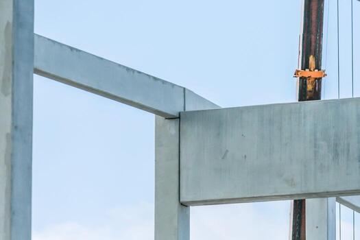 Precast concrete elements on construction site during installation process photo