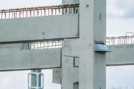 Precast concrete elements on construction site during installation process photo