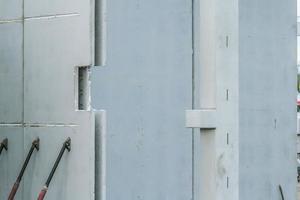 Precast concrete elements on a construction site durung installation process photo