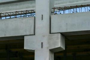 Precast concrete elements on construction site during installation process photo