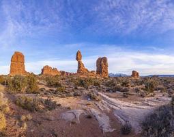 Panoramic picture of impressive sandstone formations in Arches National Park at night in winter photo