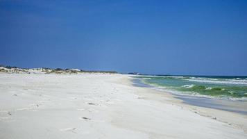 Lonely beach of Panama City in Florida in spring during daytime photo