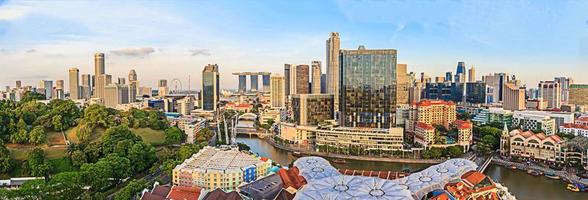 Aerial panoramic picture of the Singapore skyline during evening twilight in summer photo