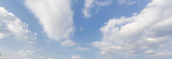 Image of a partly cloudy and partly clear sky during the day photo