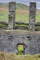 Dilapidated stone building in Irish countryside region during daytime photo