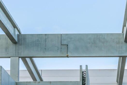 Precast concrete elements on construction site during installation process photo