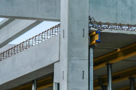 Precast concrete elements on a construction site durung installation process photo