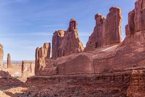 Panoramic picture of natural and geological wonders of Arches national park in Utah in winter photo