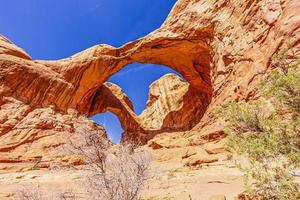 Panoramic picture of natural and geological wonders of Arches national park in Utah in winter photo