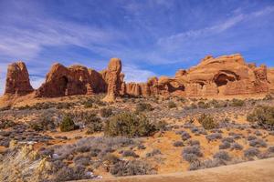 Panoramic picture of natural and geological wonders of Arches national park in Utah in winter photo