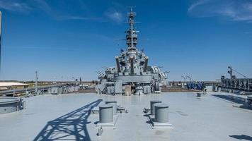 Close up pictures of old WW2 battleship during daytime photo