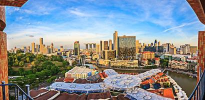 Panoramic view over the Singapore skyline at sunset photo