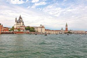 Panoramic view on Venice from lagoon during daytime photo
