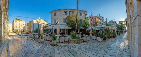 Image of the historical center of the Croatian coastal town of Porec in the morning light during the sunrise photo