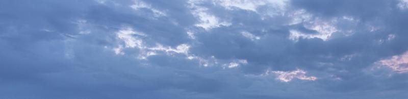 Image of a partly cloudy and partly clear sky during the day photo