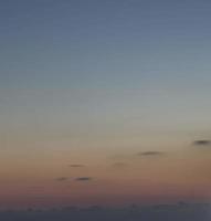 Dramatic colorful sky with afterglow and illuminated clouds photo