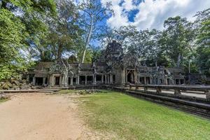 Mystical and famous ruins of Anchor Wat in Cambodia with no people in summer photo