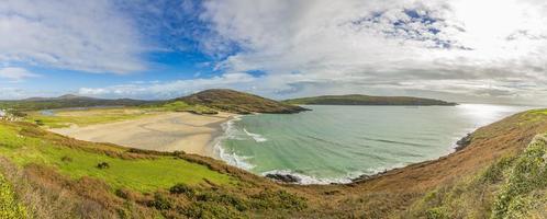 Panoramic picture of Barley Cove Beach in southern west Ireland during daytime photo