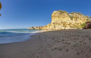 Panoramic view on cliffy Algarve coast in Portugal in summer photo