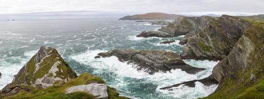 Panorama picture of Kerry Cliffs Portmagee in southern west Ireland during daytime photo