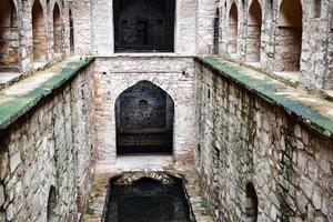 Agrasen Ki Baoli Step Well situated in the middle of Connaught placed New Delhi India, Old Ancient archaeology Construction photo