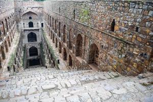 Agrasen Ki Baoli Step Well situated in the middle of Connaught placed New Delhi India, Old Ancient archaeology Construction photo