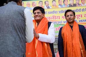 New Delhi, India - November 27 2022 - Piyush Goyal Cabinet Minister and core member of Bharatiya Janata Party BJP during a rally in support of BJP candidate ahead of MCD local body Elections 2022 photo