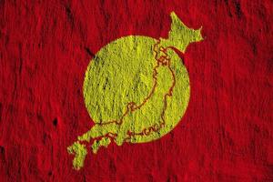 Flag of Japan and contour map of the country on the texture. Collage. photo