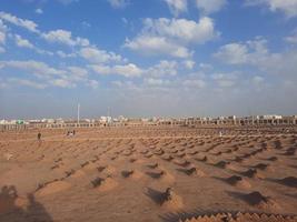 Medina, Saudi Arabia, Dec 2022 - An evening view of the Jannat al-Baqi cemetery, located some distance from Masjid al-Nabawi. photo