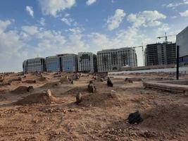 Medina, Saudi Arabia, Dec 2022 - Evening view of Jannat al-Baqi cemetery. Graves can be seen  in the historic Jannat al-Baqi cemetery near Masjid al-Nabawi, Madinah, Saudi Arabia.. photo