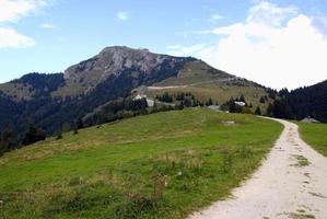 Travel to Sankt-Wolfgang, Austria. The road between the fields in the mountains. photo