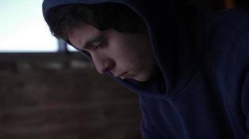 Close up Of Teenage Boy, Face, Eyes looking down video