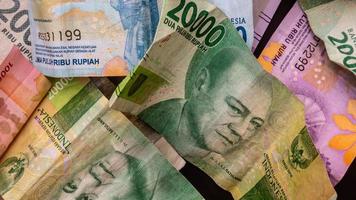 stack of rupiah banknotes as background photo