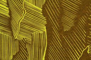 Fondo de líneas de superficie a rayas de textura asimétrica geométrica amarilla de papel abstracto. telón de fondo de forma de cartón de diseño de estructura. concepto interior de vacaciones de decoración. flatlay, primer plano, vista superior foto