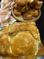 Fresh homemade puff pastry buns. Vertical photo format