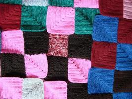 Crochet texture, colorful squares pattern. Crochet Knit Squares photo