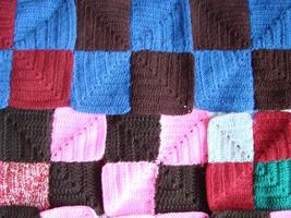 Crochet texture, colorful squares pattern. Crochet Knit Squares photo