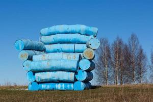 a chair made of blue barrels photo