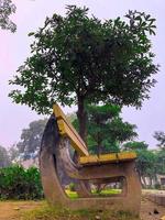 Sitting chair place in the park under a tree photo