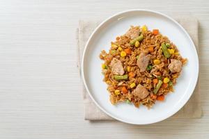 pork fried rice on white plate photo