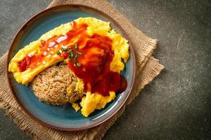 Flavored Fried Rice in an Omelet Wrapping photo