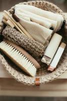 Natural product in jude basket. Bodybrush, toothbrush, shopping bag, soap. Treat yourself concept photo