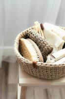 Natural product in jude basket. Bodybrush, toothbrush, shopping bag, soap. Treat yourself concept photo