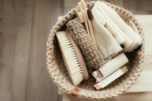 Natural product in jude basket. Bodybrush, toothbrush, shopping bag, soap. Treat yourself concept photo