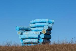 a chair made of blue barrels photo