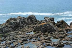 Sea waves crushing on the rocks 8 photo