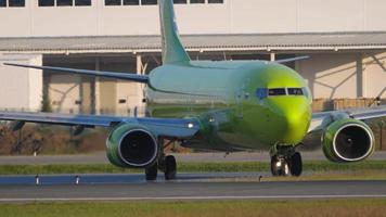 NOVOSIBIRSK, RUSSIAN FEDERATION JUNE 17, 2020 - Passenger Boeing 737, VP BNG of S7 Airlines drives the taxiway at Tolmachevo airport OVB. Tourism and travel concept video