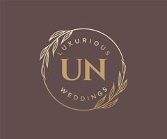 plantilla de logotipos de monograma de boda con letras iniciales de la ONU, plantillas florales y minimalistas modernas dibujadas a mano para tarjetas de invitación, guardar la fecha, identidad elegante. vector