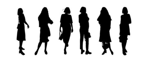 Silhouettes of a group of young girls models posing in modern clothes. For printing and laser cutting. Vector clipart.