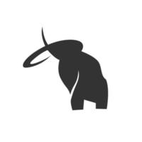 Stylized black silhouette of a mammoth on a white background. vector